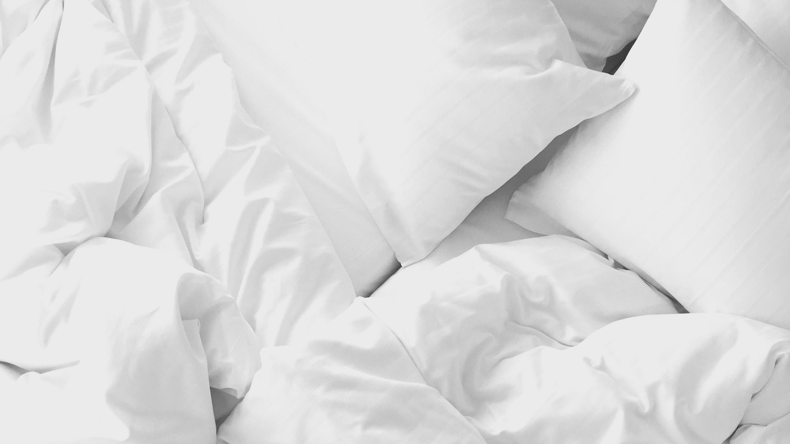 White pillows and sheets